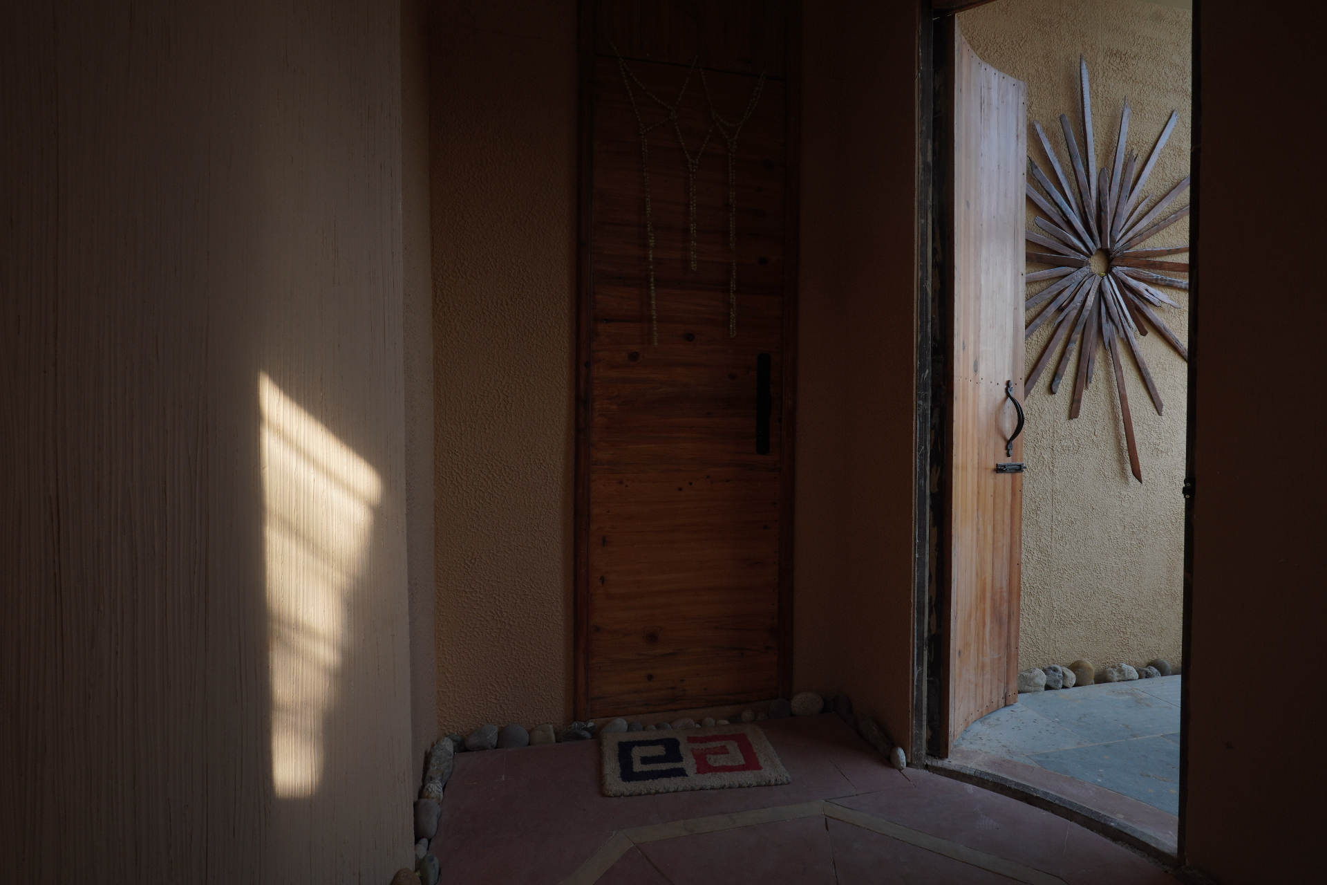 Aavya entrance bathed in morning sunlight