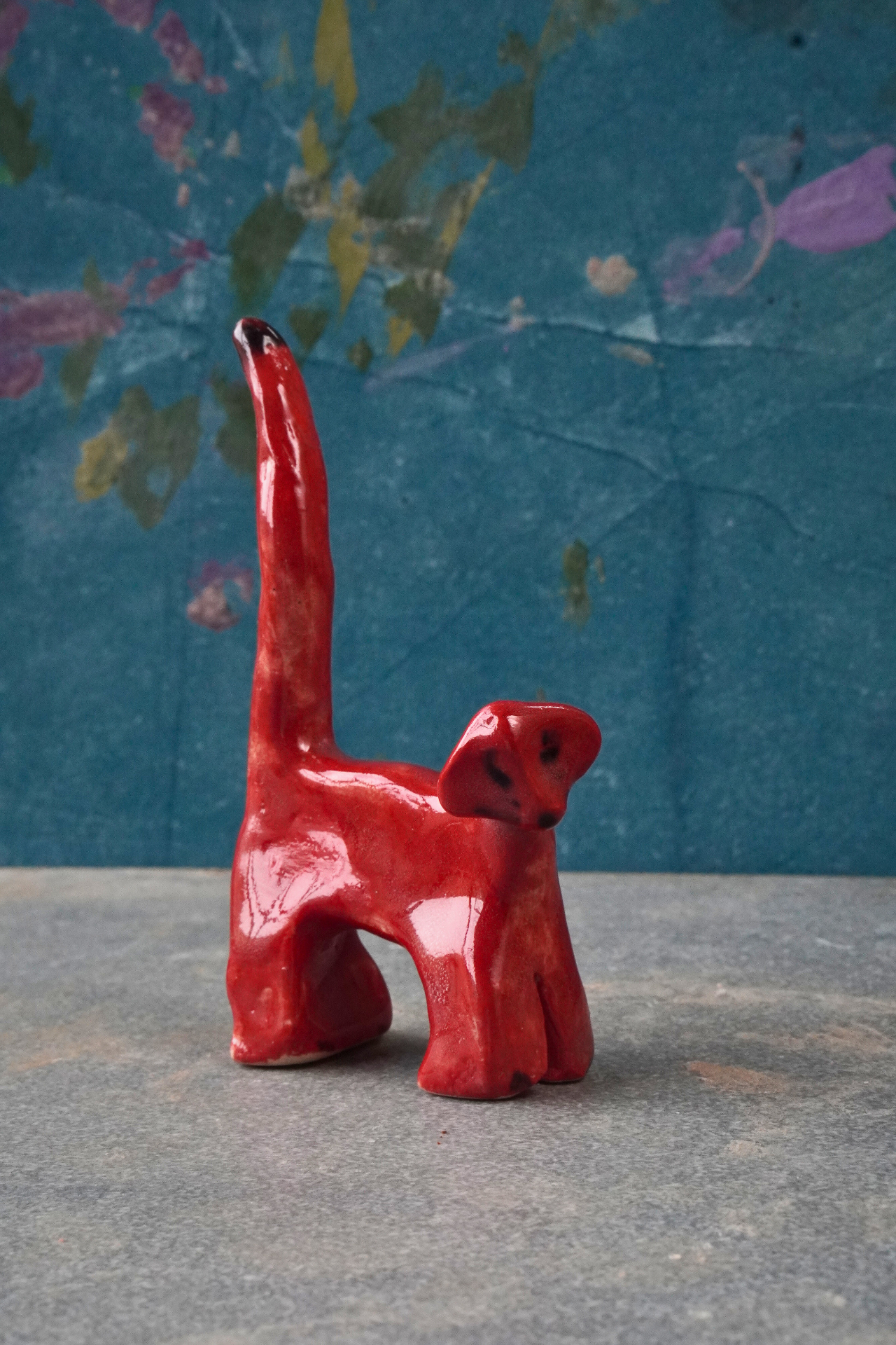 Handmade red ceramic cat figurine from Aavya Pottery Studio, Rishikesh