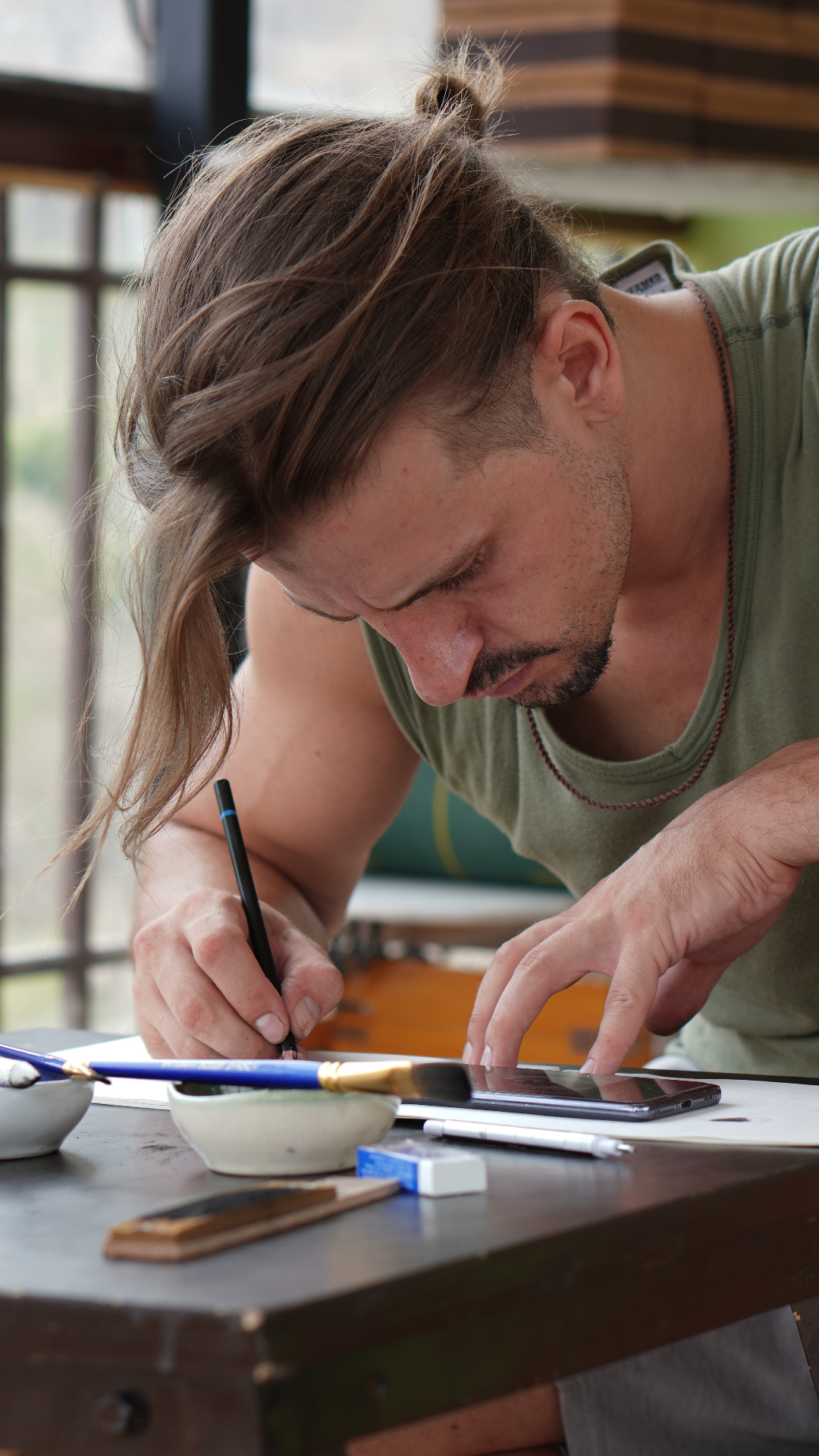 Artist sketching in the studio