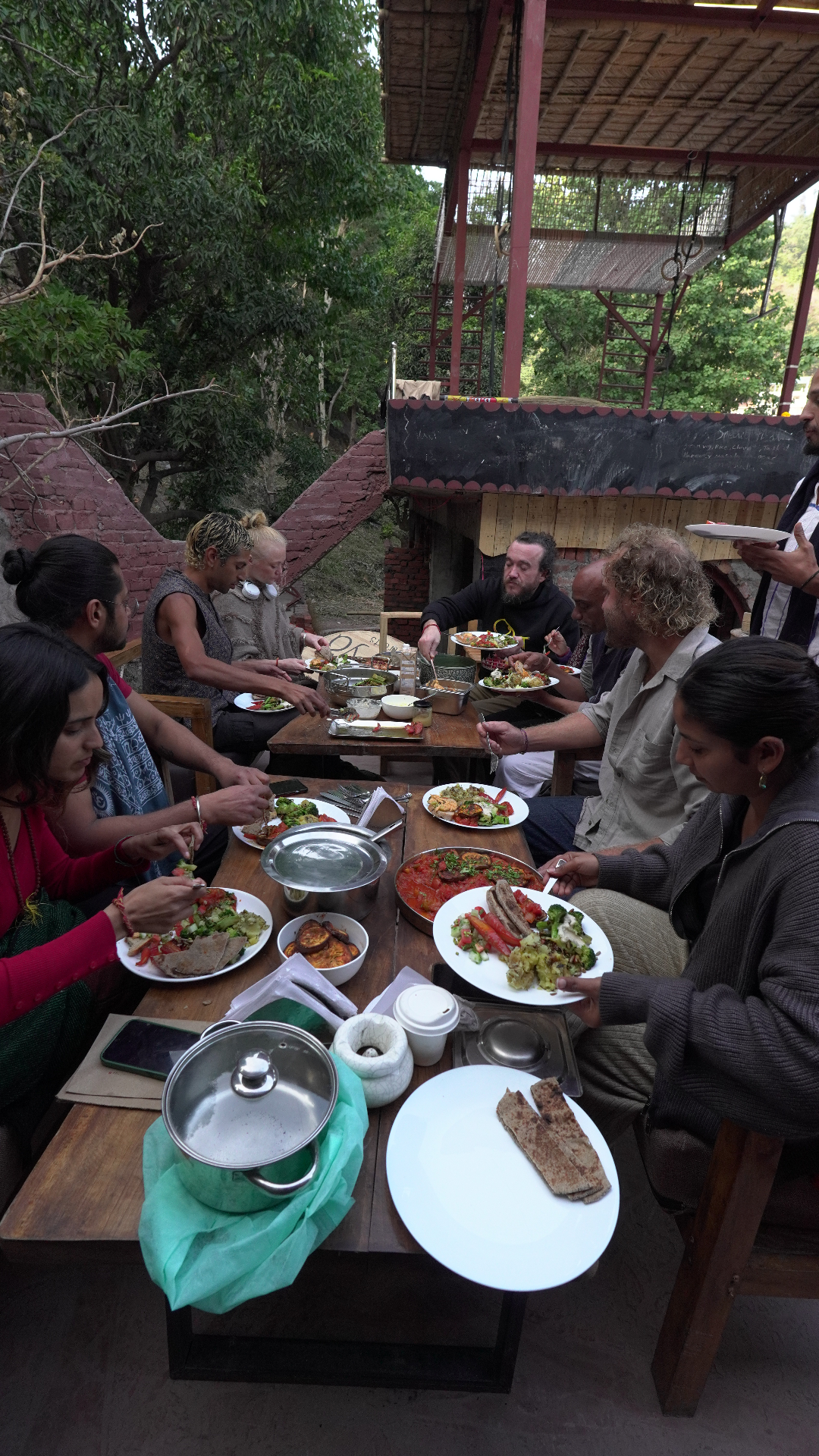 Café dining with forest backdrop