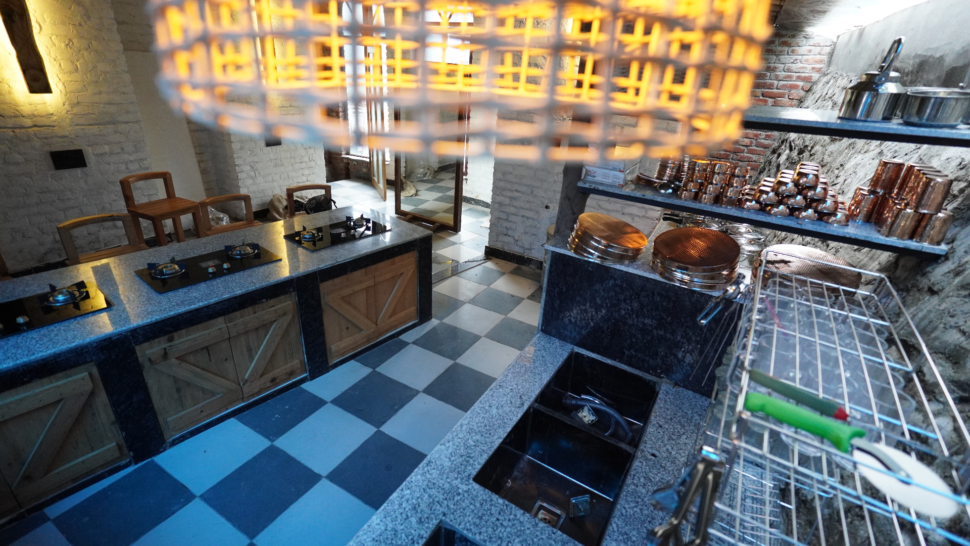 Copper kitchen with checkered tiles